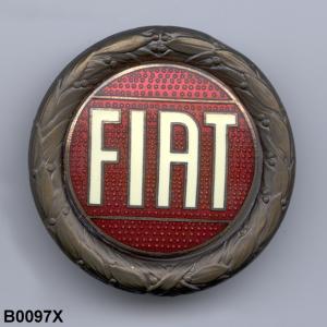 Emblem, cloisonn?, for the nose, round, NOS, red background with white lettering, brass colored wreath, 1968-74 - B0097X