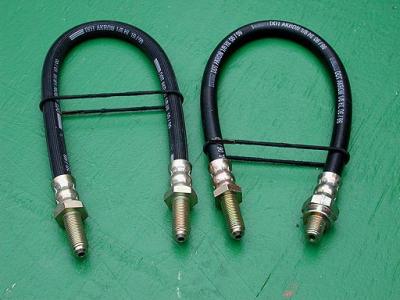 Brake hose, front, original style, new manufacture, #1365.64.019, for all Giulietta Spider, and for Giulietta Sprint only after chassis number 0200 (before this number E0141X was used), also valid for 2600 Touring Spider.  3/8 X 24, length of threaded portion on each end is 29/32, overall length is 15 3/8.  Specify dimensions, length overall and diameter and length of threaded fittings on end.  Not all were the same.  Specify dimensions, length overall and diameter and length of threaded fitting