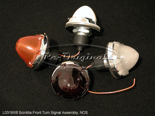 Turn signal lens, front, white or clear, Scintilla, NOS, chromed lower edge, has internal threads to screw onto housing, some lens texture and color variations available - L0319XB