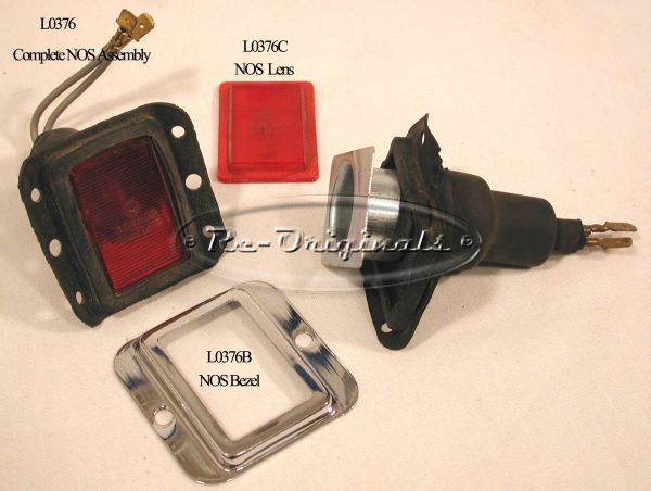 Light for door jamb, NOS, Carello, rectangular, without chrome trim plate, includes new, correct rubber boot.  For chromed bezel that surrounds this light, see L0376B. - L0376