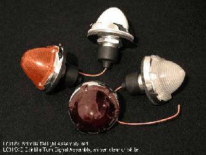 Taillight assembly, NOS, Scintilla, style with inside threads on lens, chromed edge on base and little nubs to help screw in lens - L0318X