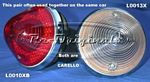 Turn signal assembly, front, NOS, clear, pointed lens style, has concentric circle pattern on lens.  Used on Dual Ghia as a back-up light - L0013X