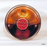 L0336X Taillight assembly, NOS, Carello or Altissimo, amber/red with reflector.  Correct, original 2 piece siamesed lens.