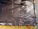 Insulation padding, silver mylar type material, not sewn, includes fiberglass batting on back, 1mt.  (40) wide, Call for a sample.EA.  PIECE IS 40X48 - UAA009